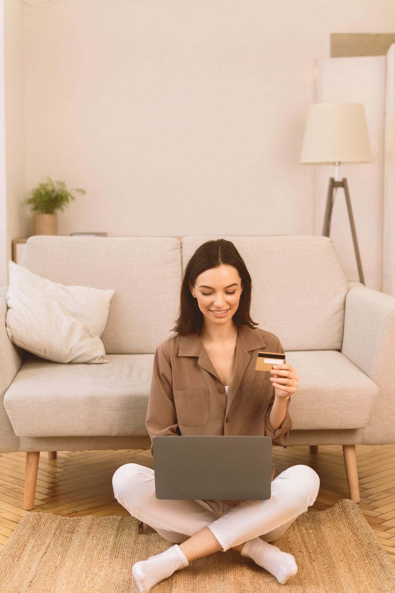 girl-making-purchases-sitting-on-the-carpet.jpg